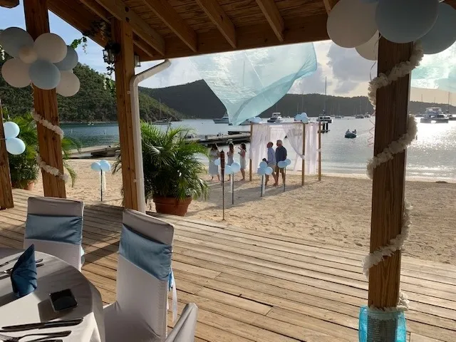 The Club deck decorated for a beach ceremony
